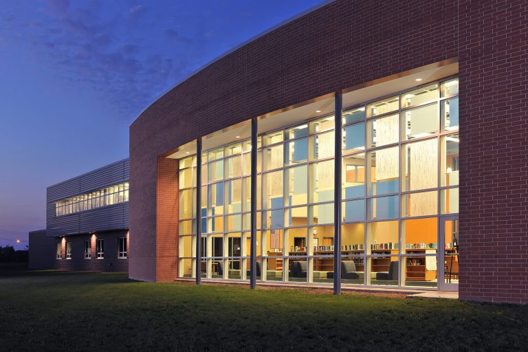 Exterior media center curtain wall at night