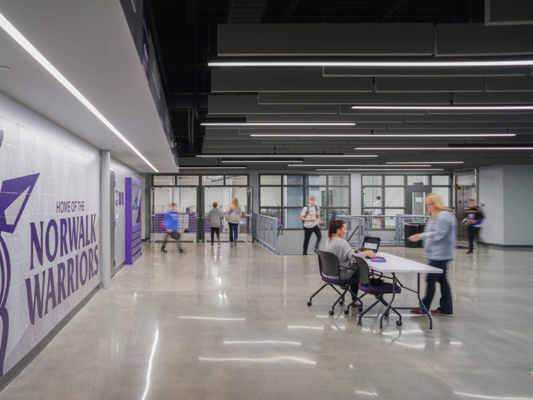 Entrance lobby highlighting ceiling blades and wall graphic